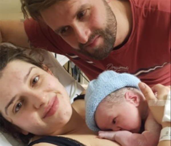 Elisia Rogers, 25, and partner Stephen with their son Tedi shortly after his birth
