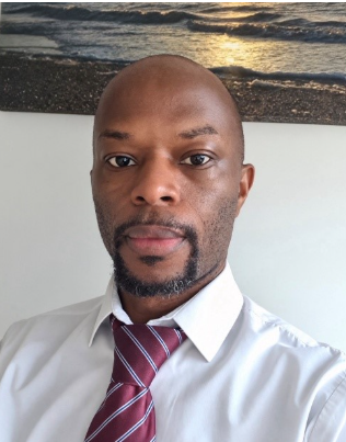 Dr Herbert Mwebe.png