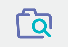 magnifying glass over computer folder