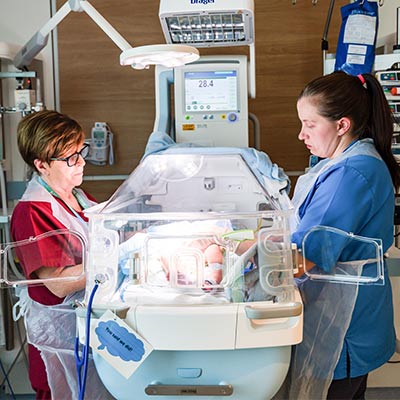 Midwives attend a baby