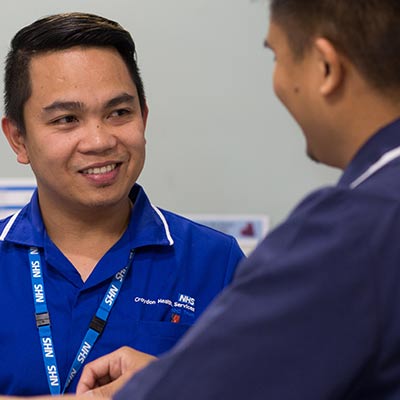 Two nurses talking
