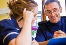 Nurse studying with colleague Nurse studying with colleague
